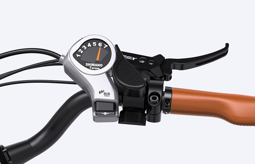 Close-up view of the right grip, Shimano 7-speed, brake controller, and throttle of a Heybike e-bike