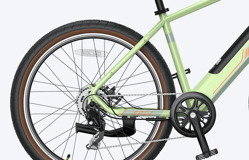 Close-up view of spoke wheel, gear, and pedal