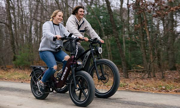 a couple are riding Brawn and Range ebike