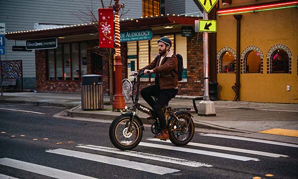 a man is riding Mars ev bike at night