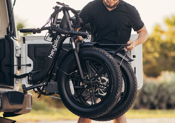 The folded Ranger e-bike has been placed on the RV trunk