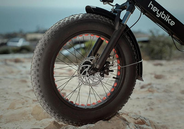 Close-up view of 20 inch by 4 inch resistant fat tires