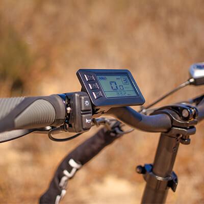Close-up view of the left grip, 3-level pedal assist mode, and led display