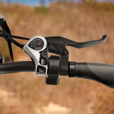 Close-up view of the right grip, shimano 7-speed, brake controller on the Heybike e-bike